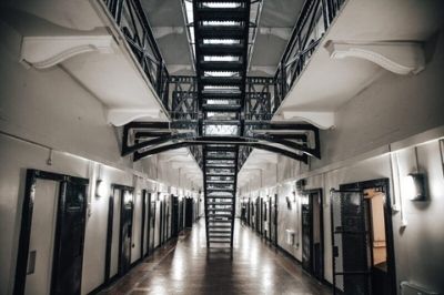 How can security technology support 21st-century prison systems?